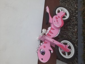 Rowerek drewniany dino